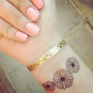 tatauajes para mujeres muneca flor