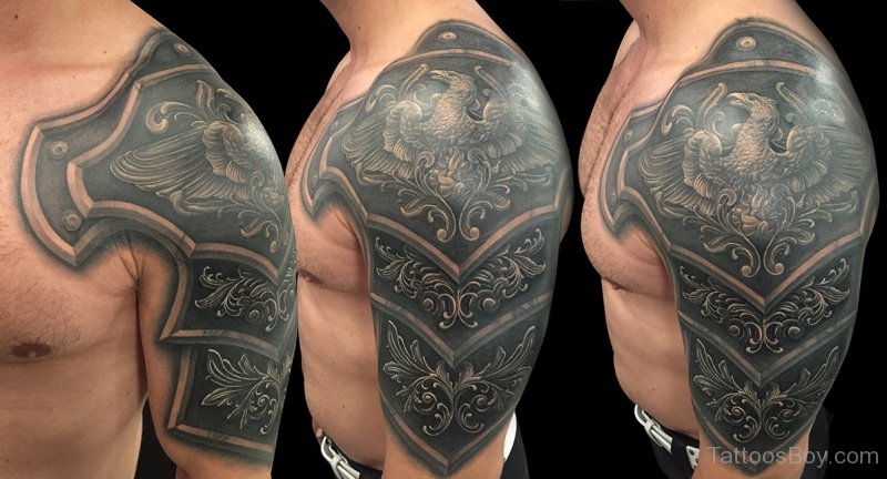 attractive armor tattoo on shoulder for men