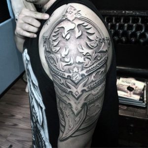 aztec armor tattoo on half sleeve for men