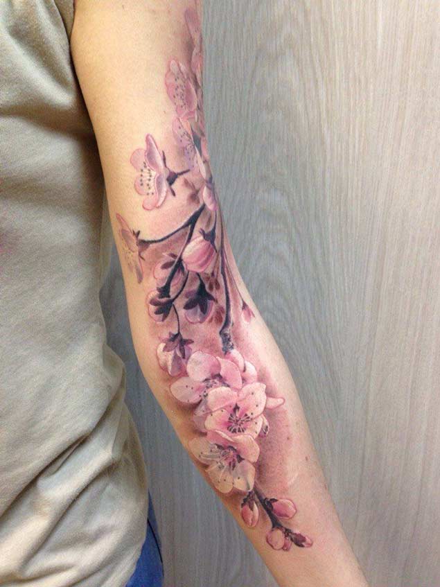 amazing cherry blossom tattoo on left sleeve