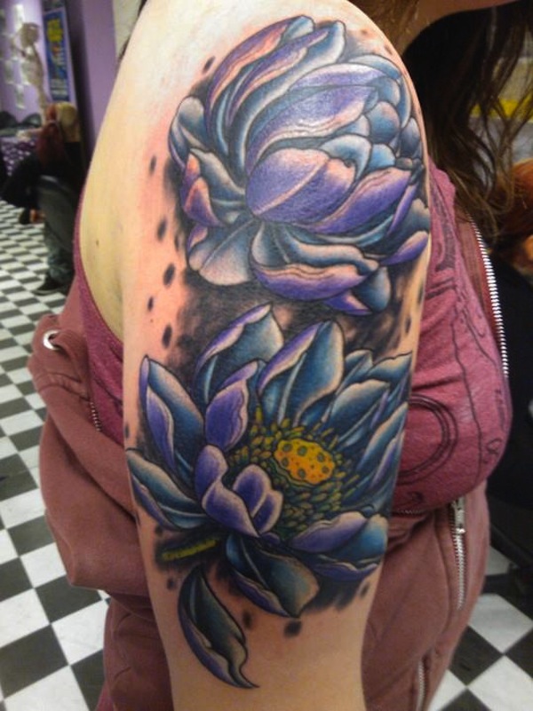 wonderful two lotus flowers tattoo on girl right half sleeve
